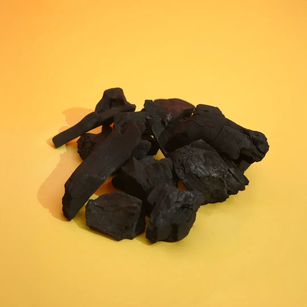 Pile of black charcoal pieces for grill